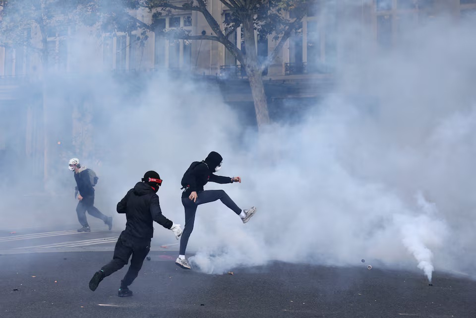Macron vows legal action against perpetrators of violence in France protests