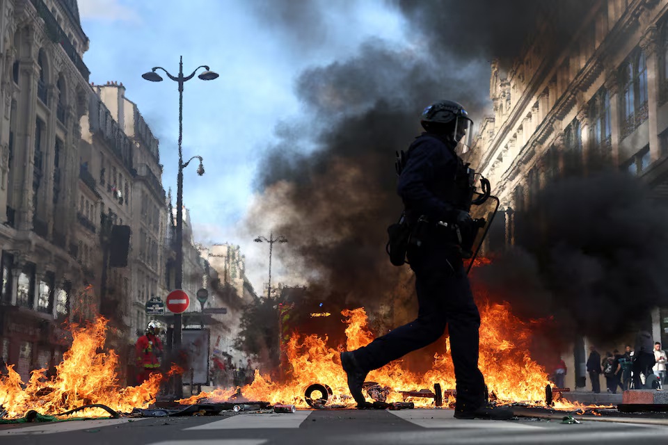 Macron vows legal action against perpetrators of violence in France protests